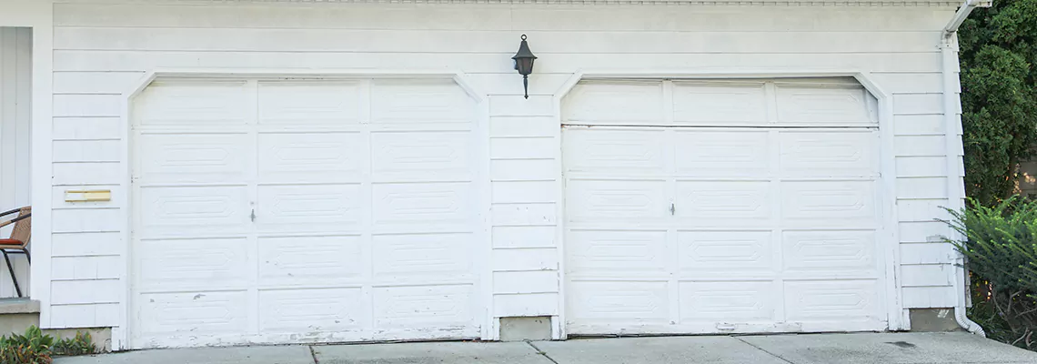 Roller Garage Door Dropped Down Replacement in Pembroke Pines, FL